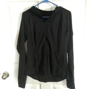 Lululemon “Mist Over Windbreaker” Black hooded jacket with pockets, size 8